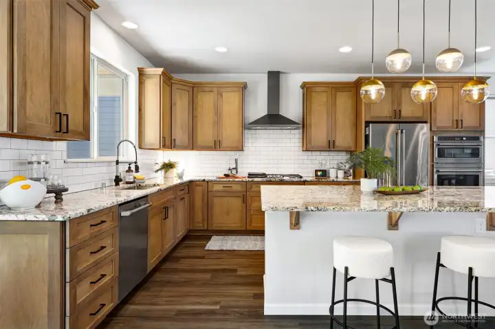 Photos don't show the sizeof this kitchen. The Island is huge! and room for all your friends and neighbors!