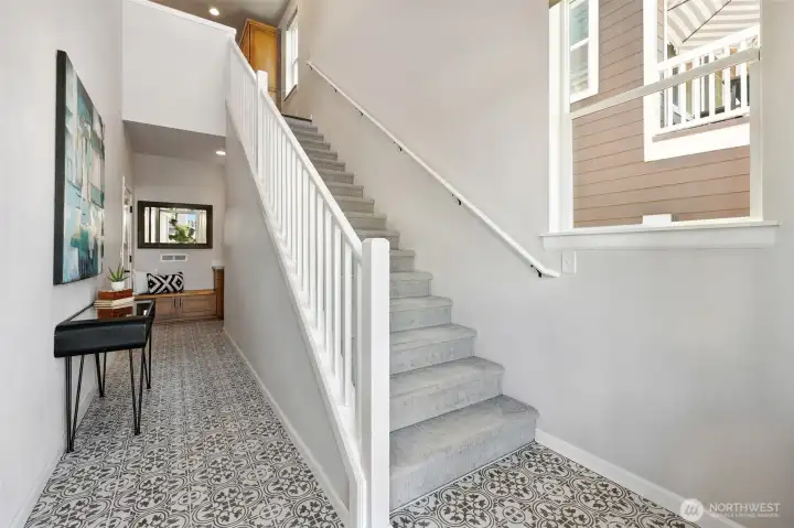 Down the stairs to the 2- car garage. Closet storage and cabinetry for coats and shoes as you come and go.