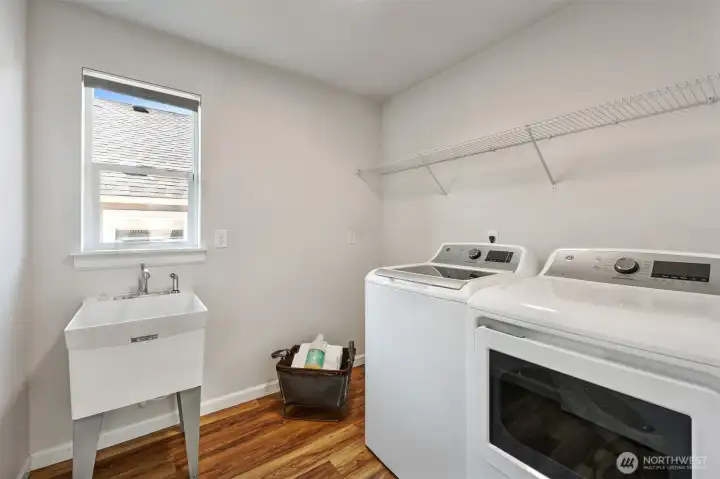 Laundry room located conveniently next to the bedrooms