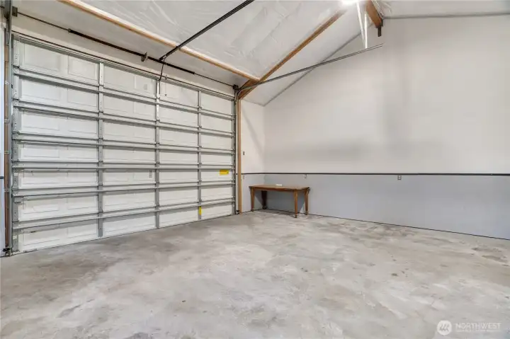 Full overhead clearance. Fully insulated. Wainscoted walls. Outlets where you need them. This bay means business.
