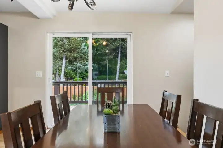 The dining room has its own ceiling fan.
