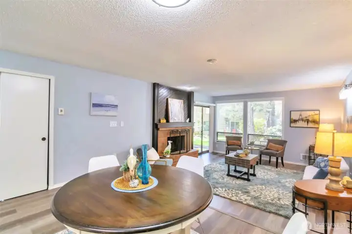 View of living room and dining room.