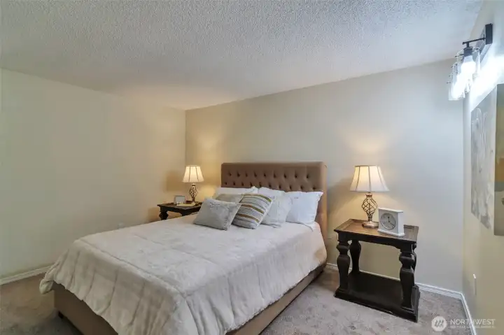2nd view of master bedroom.  Extra wall lighting.