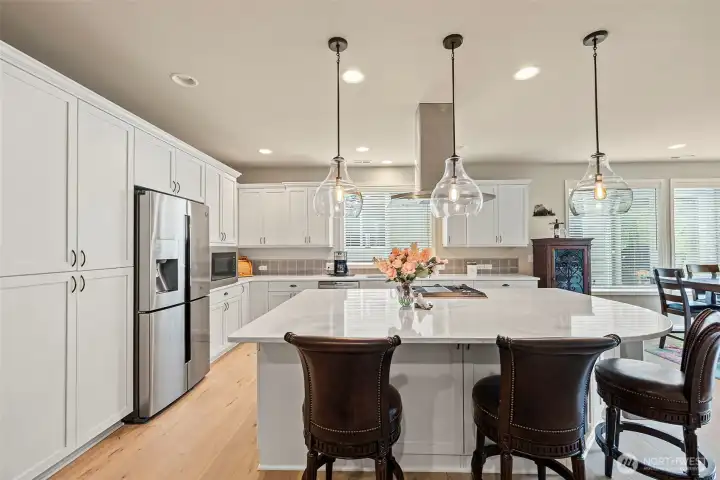 Huge Island With Quartz Countertops.