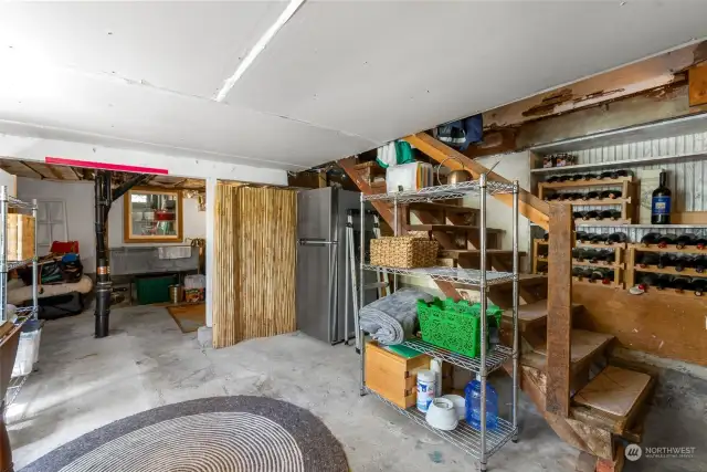 Laundry room and plenty of storage space in basement