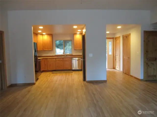 Looking toward Kitchen and front door entry/hall