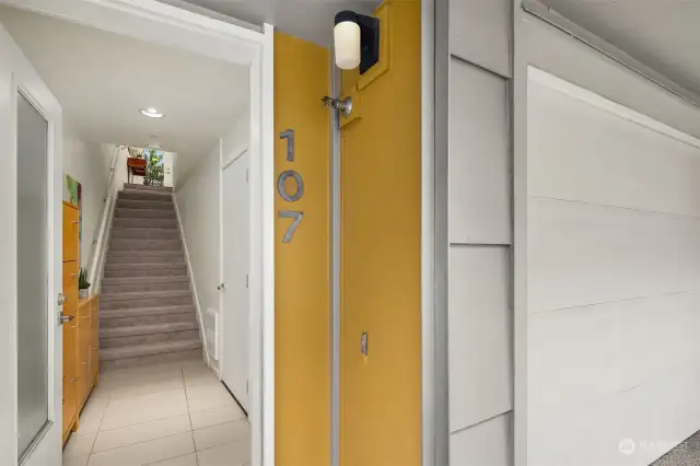 The door to the right of the stairs leads to your own private, spacious 2 car tandem garage with plenty of room for storage. Brand new carpet on the stairs—and the rest of the unit is engineered hardwoods. Note that the exterior of the units is durable cement plank.