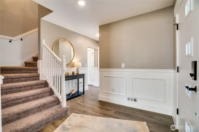 Observe the seamless continuity of the chair rail and wainscoting throughout this home. Now, let's head upstairs!