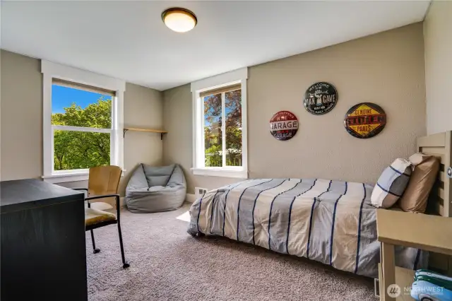 This third upstairs bedroom is warm and sunny, but don't forget there are black out shades in all the bedrooms.