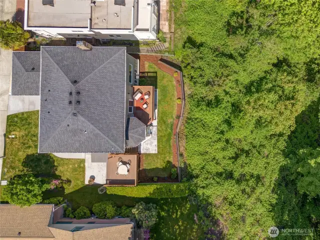 This stunning bird’s-eye view highlights the private backyard and two view decks, perfect for soaking in the natural beauty of the Pacific Northwest. During winter, enjoy views of the Sound, and the majestic Bald Eagle nest provides a front-row seat to nature’s wonders year-round.
