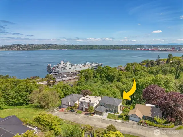 Situated on a serene cul-de-sac with only three neighboring homes, this tranquil enclave offers strolling proximity to Garfield Park, Annie Wright Schools, Old Town, and Ruston Way.