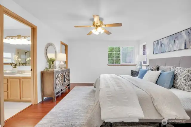 Expansive primary bedroom with en-suite and walk-in closet.