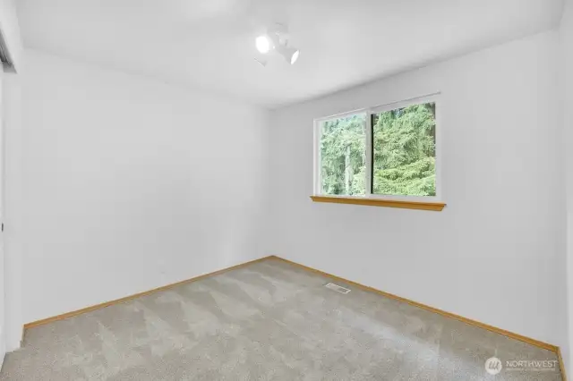 There are four bedrooms upstairs in total. This bedroom is #1 on the second floor.