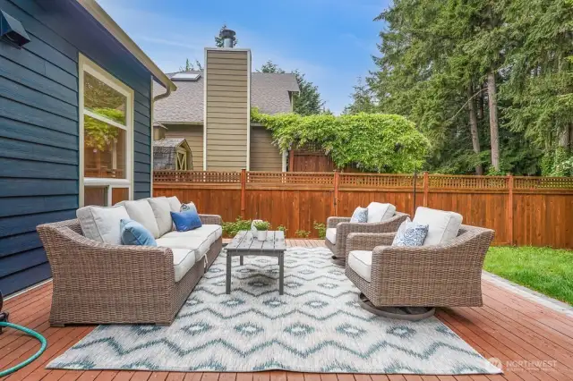 This home has so much privacy in the back yard. It features a large deck, new paver walkways with landscape lighting, and a large concrete patio on the side of the home.