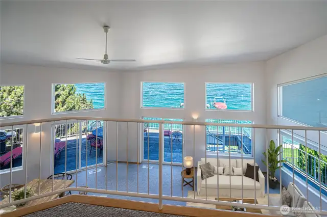 Loft overlooking main living area  Virtually staged