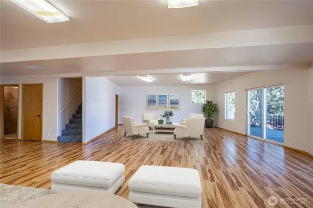 Plenty of open space in lower level for work and play  Virtually staged