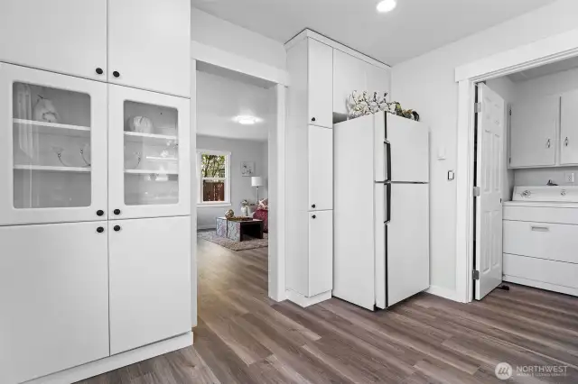 View of kitchen to living room and utility room~