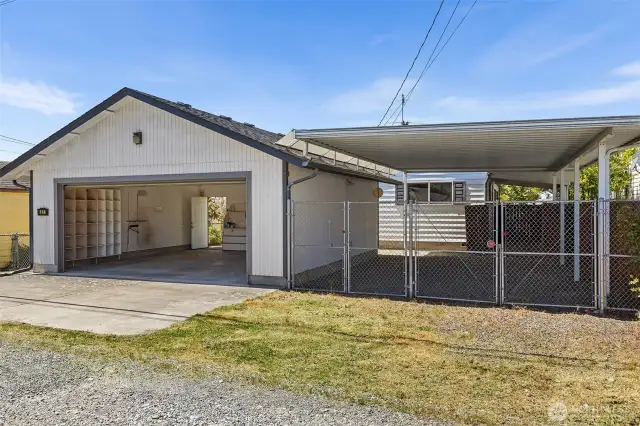 Rear of Property w/ Gated entrance to Carport & 2 Car Garage~