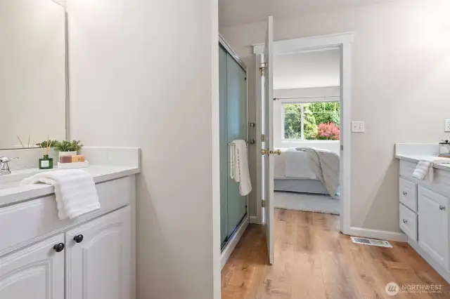 Two vanities on main level primary ensuite.