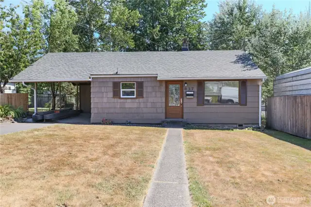 Charming and move-in ready with fresh exterior paint and a new roof and gutters—great curb appeal! Ample off-street parking provides room for multiple vehicles.