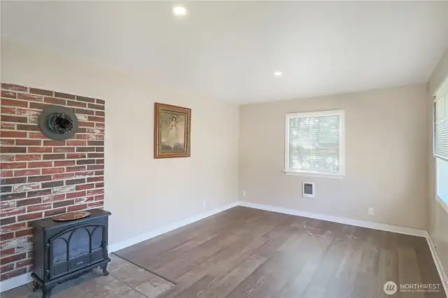 Ample space in the living room for everyday living and gatherings.