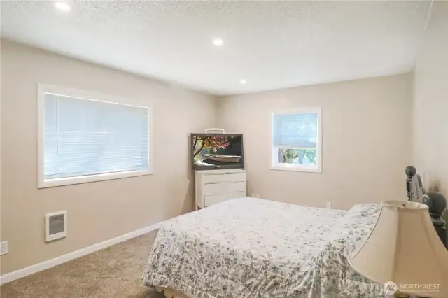 Well-sized bedroom offers flexibility for guests, work, or just a good nights sleep.