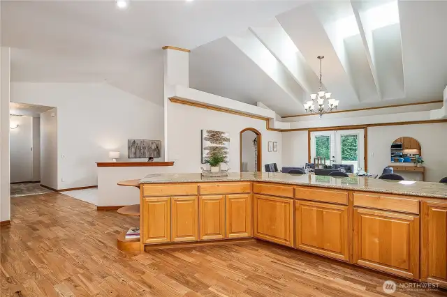 View from the stove looking towards the Dining and Living Rooms.
