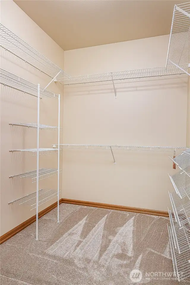 Primary bedroom walk-in closet.