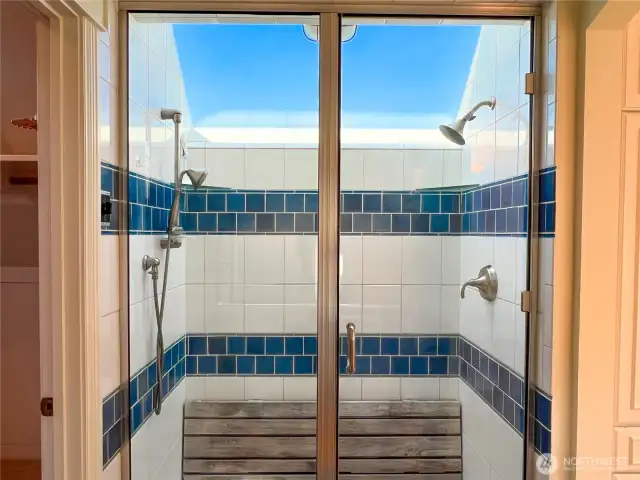Two headed shower under the blue sky.