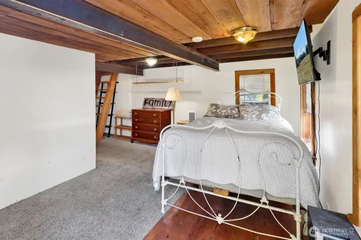 The lower level houses a bedroom and full bathroom