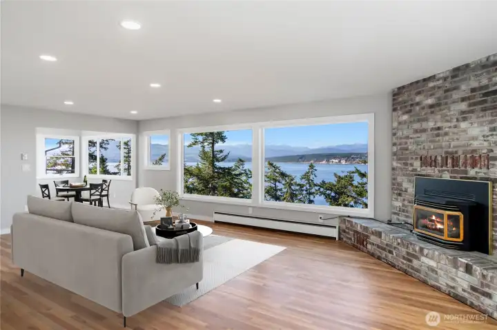 Spacious living room with breathtaking views and a cozy propane fireplace.