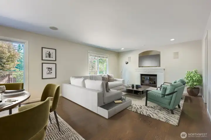 Family room just off kitchen features a gas fireplace.