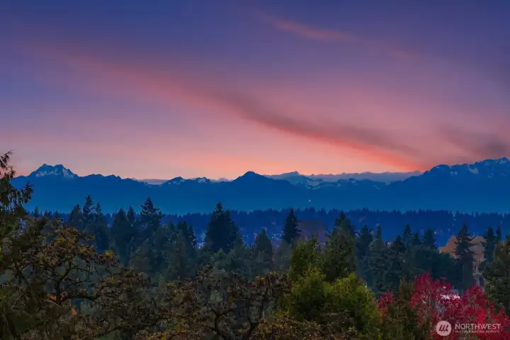 Enjoy sunsets with this west facing back yard and on clear days views of the Olympics