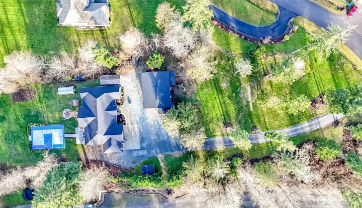 arial view showing greenhouse, sport court, shop
