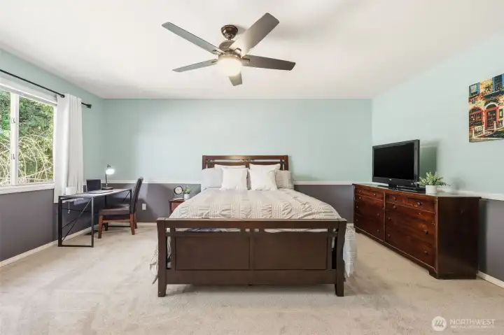This bedroom could be a home theater or bonus room