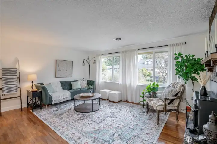 Expansive hardwoods have been painstakingly & naturally restored.