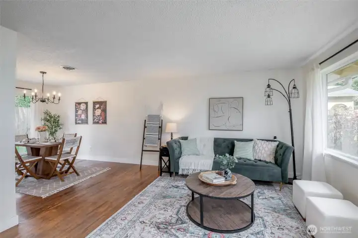 Living room flows seamlessly into the dining room.