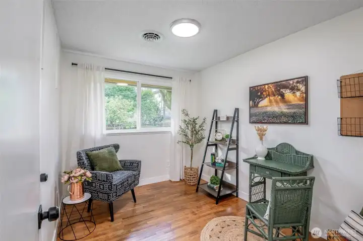 Bedroom 1 overlooks the backyard- wetstern exposure.