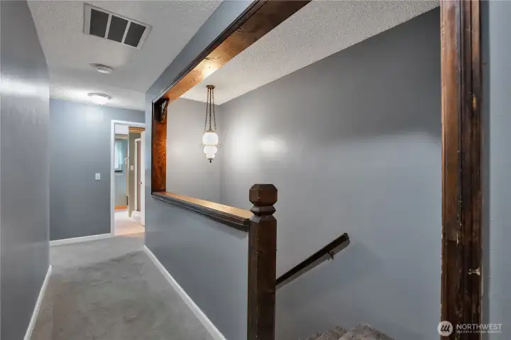 Hall way and stairs to basement