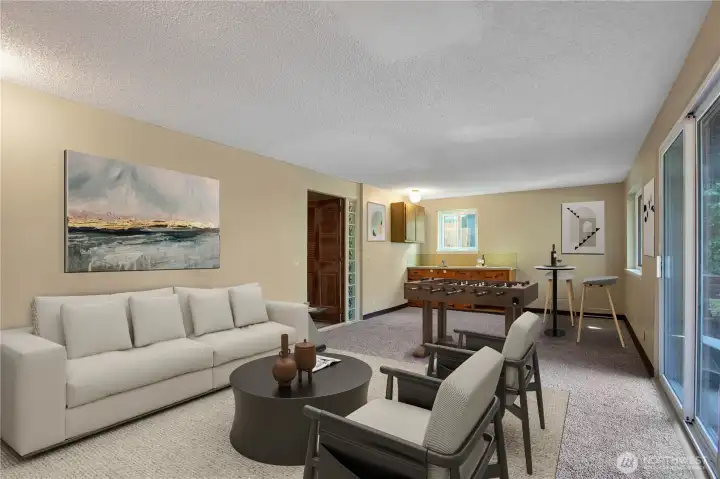 Rec Room in the basement with a wet bar.  Great flexible space for multi-gen living, crafting, game room or working.