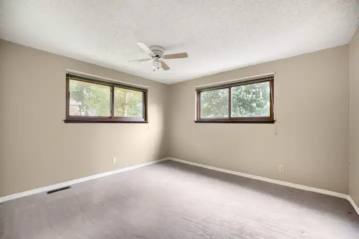 3rd bedroom on main with no virtual staging 3rd bedroom on main with no virtual staging