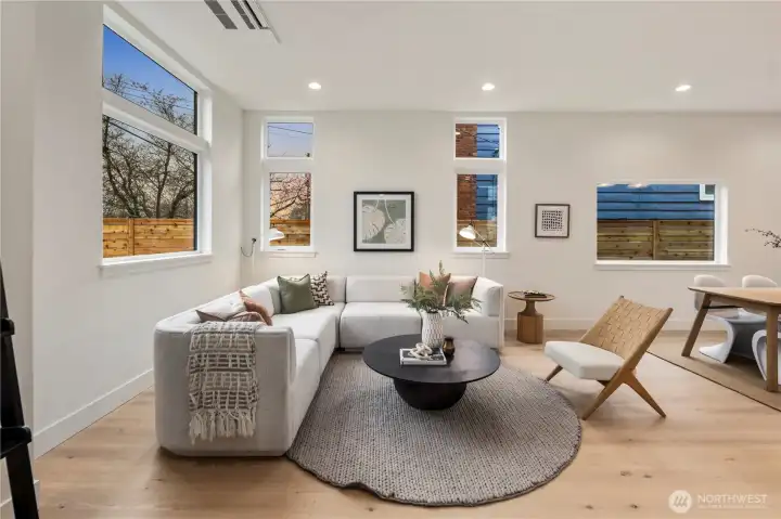 High ceilings, natural light and beautiful hardwood floors impress upon the senses