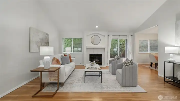 Living room with high vaulted ceilings. Freshly painted