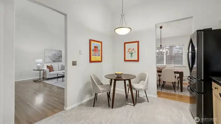 Eat in kitchen space. To the left is the living room. To the right is the dining area.