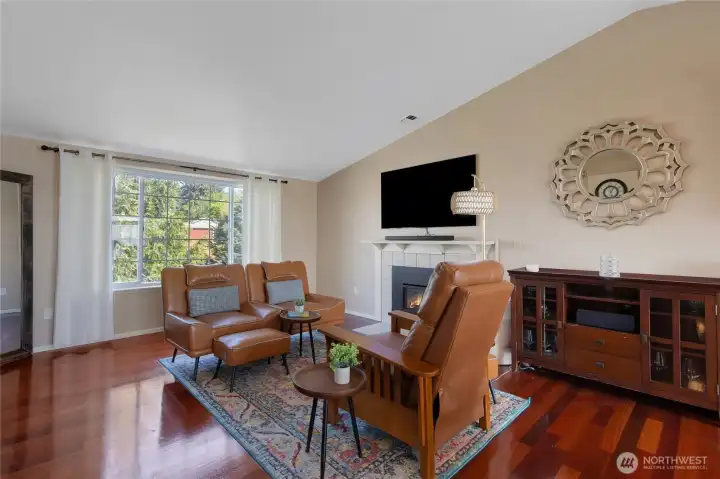 Brazilian Cherry Floors & Cathedral Ceilings provide Open Concept Space