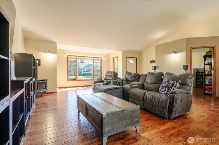 Large living room with vaulted ceiling.