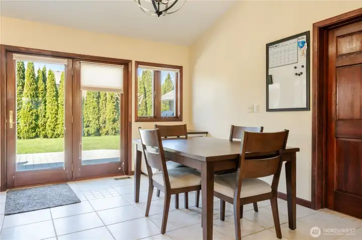 Dining room with easy access to the deck for entertaining.