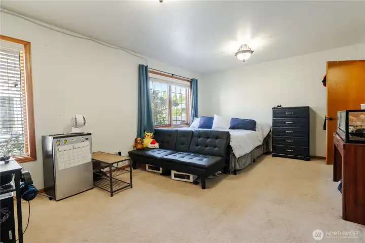 Second Bedroom is very large with a sitting are nook near the northwest window. Large enough to use as a double bedroom.