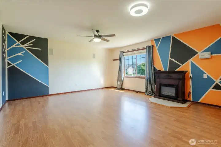 Large Flex room/Family/Media room. Lots of uses for this room. Hardwood laminate flooring. Wired for cable, speakers. Speakers in east wall. Controller for irrigation on far wall.
