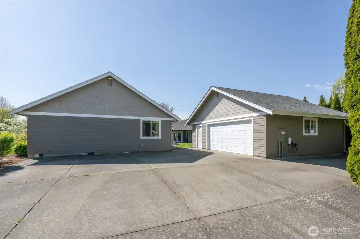 Driveway with parking for 3-5 cars.
